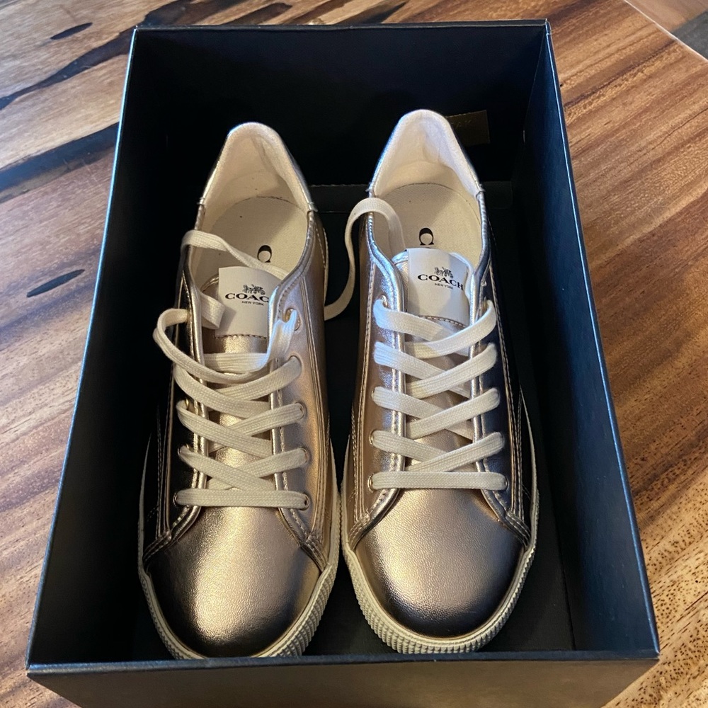 Coach shoes in gold